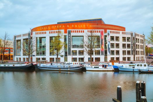 AMSTERDAM - APRIL 16: Nationale opera and ballet building (Stopera) on April 16, 2015 in Amsterdam, Netherlands. The Stopera is located in the center of Amsterdam.