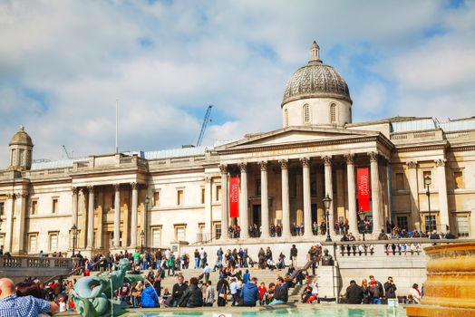 LONDON - APRIL 6: National Gallery building at Trafalgar square on April 6, 2015 in London, UK. Founded in 1824, it houses a collection of over 2,300 paintings dating from the mid-13th century to 1900.