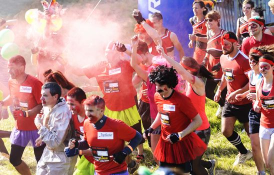 LYON, FRANCE - MAY 24: Crazy group of sportive people all are dressd,  Frappadingue race participating in the event in the Miribel Jonage Park to Lyon on May 25, 2015. People from all walks of life participated in the run.