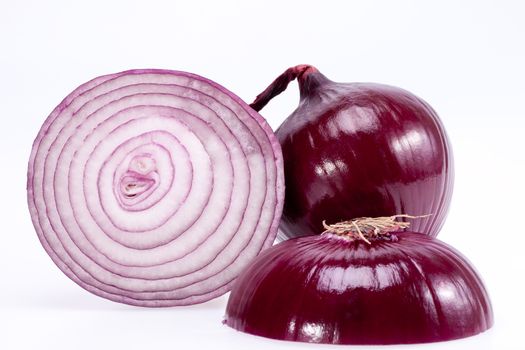 the cut red onion isolated on white background