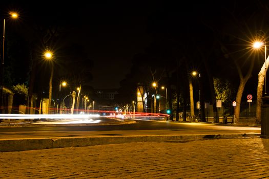 street in Rome at night with light trails