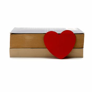 book and heart isolated on white background concept love to learning