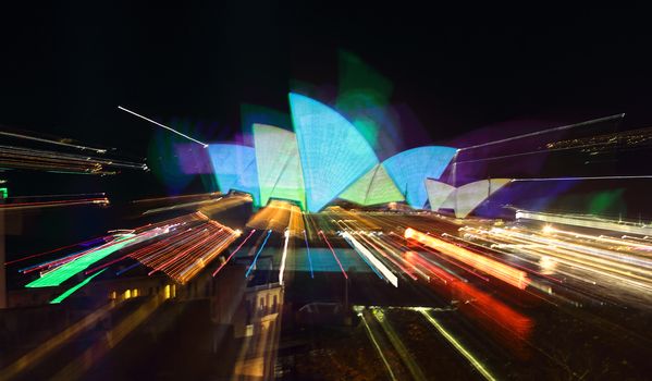 SYDNEY, AUSTRALIA - MAY 23, 2015; Sydney Opera House an abstract capture of the colours illuminating the sails of the Sydney Opera House during Vivid Sydney, using an in camera technique.
