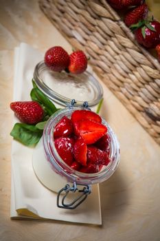 Strawberry tiramisu with mascarpone in glass. Close up