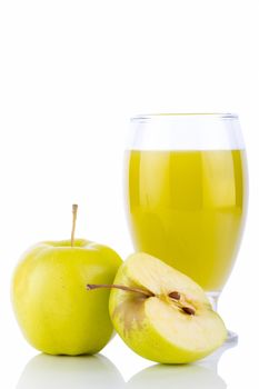 Apple juice in glass and green apples. Isolated on white background