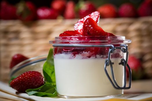 Strawberry tiramisu with mascarpone in glass. Close up