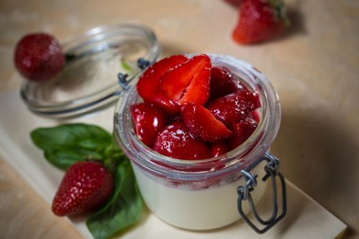 Strawberry tiramisu with mascarpone in glass. Close up