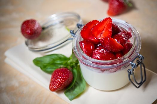 Strawberry tiramisu with mascarpone in glass. Close up