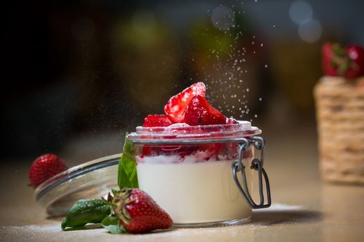 Strawberry tiramisu with mascarpone in glass. Close up