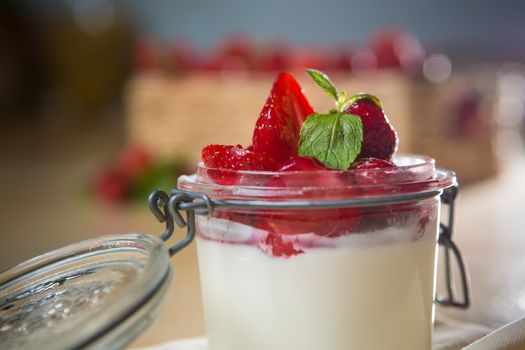 Strawberry tiramisu with mascarpone in glass. Close up