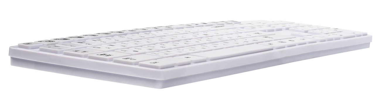 Computer keyboard on isolated white background, side view