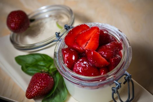 Strawberry tiramisu with mascarpone in glass. Close up