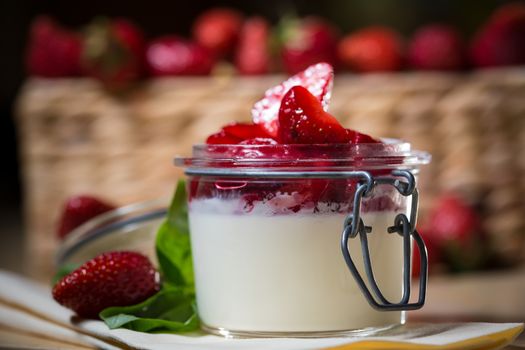 Strawberry tiramisu with mascarpone in glass. Close up