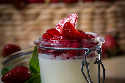 Strawberry tiramisu with mascarpone in glass. Close up