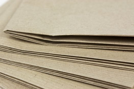 Stack of folded up brown parcel paper