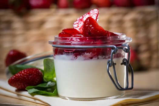 Strawberry tiramisu with mascarpone in glass. Close up