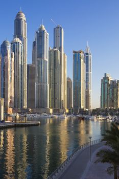 DUBAI, UNITED ARAB EMIRATES - NOVEMBER 11: view of Dubai Marina Towers in Dubai, United Arab Emirates on November 11,2014. Dubai Marina is a district in Dubai and an artificial canal city.