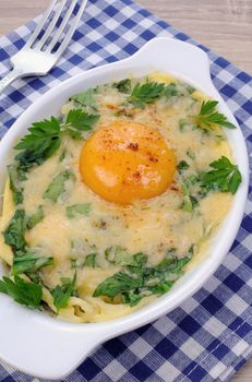 baked spinach and cheese with egg yolk