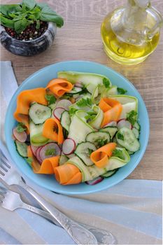 Salad   ribbon of carrot and zucchini with radish and cucumber