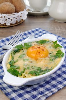 baked spinach and cheese with egg yolk