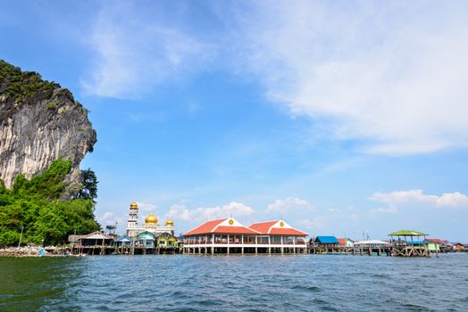 Beautiful landscape sea and blue sky in summer at Punyi Island or Koh Panyee is fisherman village cultural attractions travel by boat in Phang Nga Bay or Ao Phang Nga National Park, Thailand