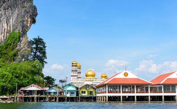 Beautiful landscape sea and blue sky in summer at Punyi Island or Koh Panyee is fisherman village cultural attractions travel by boat in Phang Nga Bay or Ao Phang Nga National Park, Thailand, 16:9 Widescreen