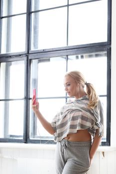 Beautiful blonde with mobile phone