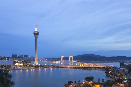 Macau Tower and Ponte de Sai Van bridge, This photo was shot in the evening after sunset.