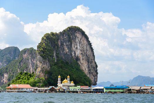 Beautiful landscape sea and blue sky in summer at Punyi Island or Koh Panyee is fisherman village cultural attractions travel by boat in Phang Nga Bay or Ao Phang Nga National Park, Thailand