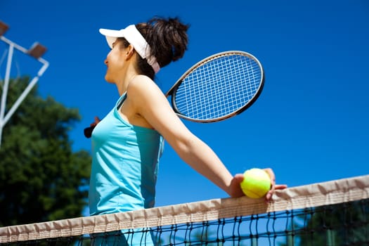 Girl Playing Tennis, summertime saturated theme