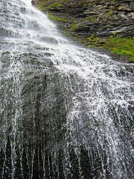 Waterfall Girlish Braids Between The Mountains Of Northern Caucas