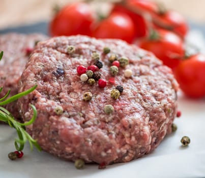 Raw Minced Hamburger Meat with Herb and Spice Prepared for Grilling