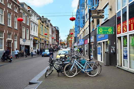 The Hague, Netherlands - May 8, 2015: People visit China town in The Hague on May 8, 2015. The Hague's Chinatown is located in the city centre, on the Wagenstraat.