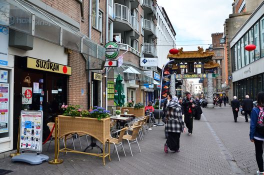 The Hague, Netherlands - May 8, 2015: People visit China town in The Hague on May 8, 2015. The Hague's Chinatown is located in the city centre, on the Wagenstraat.