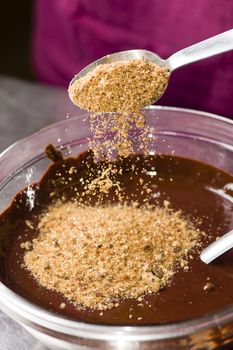 Sugar cane powder sprinkled on chocolate preparation