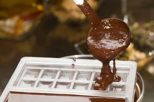 Mixed chocolate poured on bar mold
