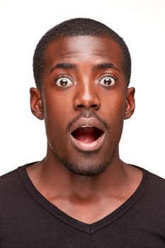 portrait of handsome young black african smiling man,  isolated on white background. human emotions - surprise. face close up