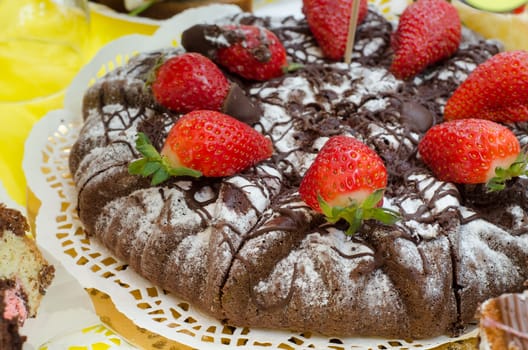 Strawberry browny cake cut into triangles on the dish