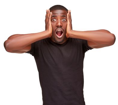 portrait of handsome young black african man,  isolated on white background. human emotions - surprise, amazement, delight. face close up