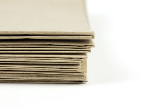 Stack of folded up brown parcel paper