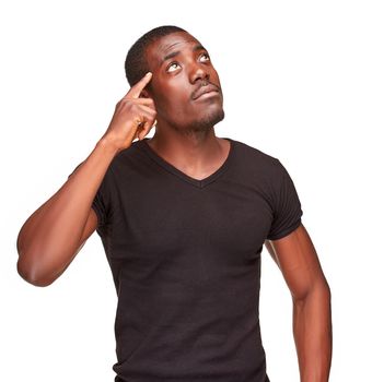 Young  black african man, thinking and looking up, isolated on white background