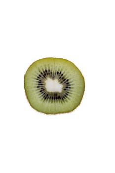 Delicious juicy halved fresh kiwifruit showing the sweet succuent pulp and ring of seeds forming a decorative pattern, isolated on white