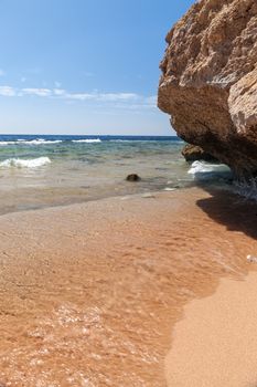 Panorama of the beach at reef, Sharm el Sheikh, Egypt. beach and cliffs overhanging the water