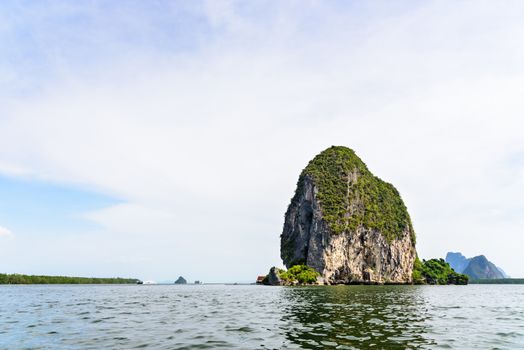 Beautiful landscape sky and sea. Back of Punyi Island or Koh Panyee during travel by boat in Phang Nga Bay or Ao Phang Nga National Park, Thailand