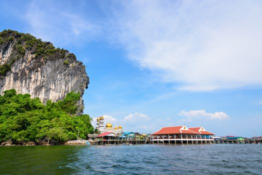 Beautiful landscape sea and blue sky in summer at Punyi Island or Koh Panyee is fisherman village cultural attractions travel by boat in Phang Nga Bay or Ao Phang Nga National Park, Thailand