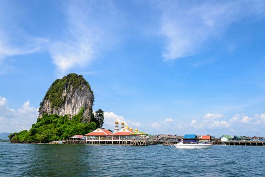 Beautiful landscape sea and blue sky in summer at Punyi Island or Koh Panyee is fisherman village cultural attractions travel by boat in Phang Nga Bay or Ao Phang Nga National Park, Thailand