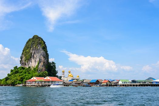 Beautiful landscape sea and blue sky in summer at Punyi Island or Koh Panyee is fisherman village cultural attractions travel by boat in Phang Nga Bay or Ao Phang Nga National Park, Thailand