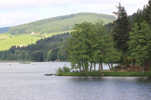 Lac des sapins "the lake of the fir-trees" is an artificial lake located in the region of Rhône-Alpes - 65 km northwest of the city of Lyon (France)