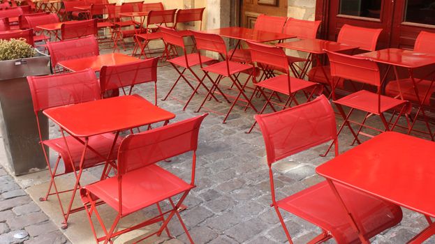 Chairs and tables of a restaurant in vieux Lyon