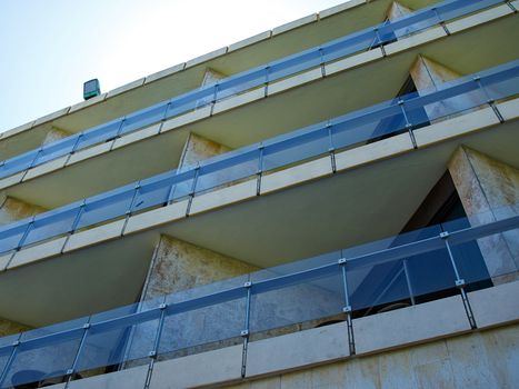 Pattern of hotel room balconies made of stone and marble